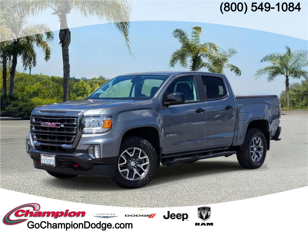 Satin Steel Metallic Used 2022 GMC Canyon 4WD Crew Cab 128 AT4 w/Leather  in , 